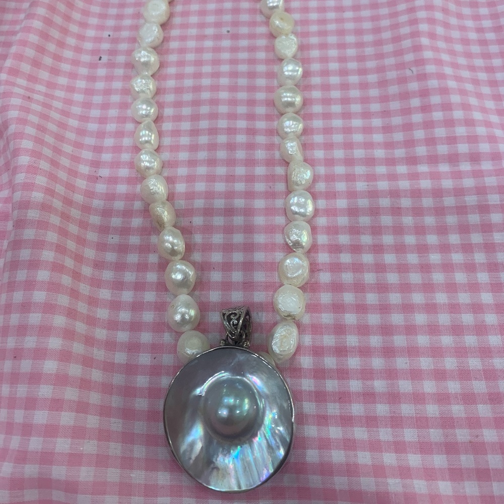 Seed Pearl necklace with oyster pearl and silver attachment
